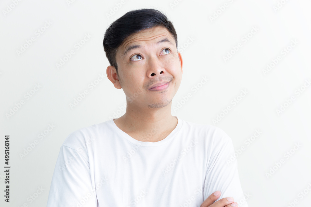 The smiles and happy faces of Asian men presenting a white background / advertising model concept The smiles and happy faces of Asian men presenting a white background / advertising model concept