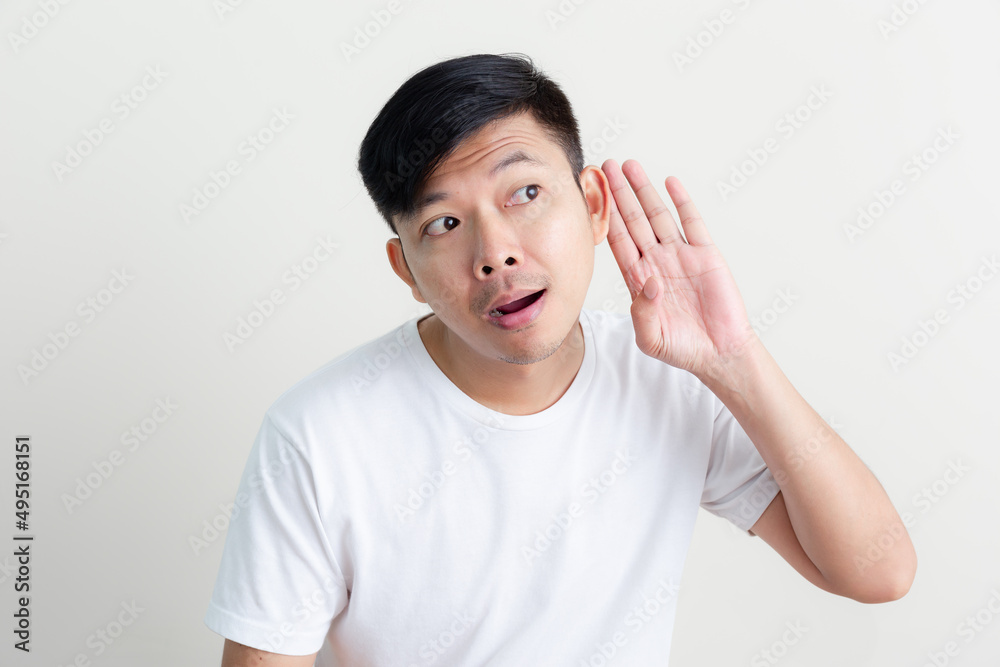 Positive human facial expressions and emotions/ wow and happy faces of Asian men presenting a white background Positive human facial expressions and emotions/ wow and happy faces of Asian men presenting a white background