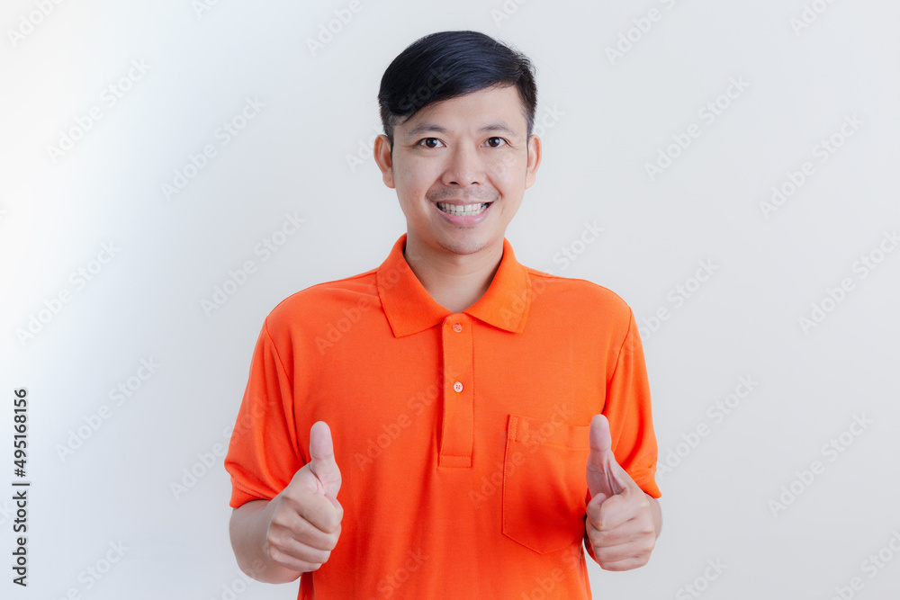 The smiles and happy faces of Asian men presenting a white background / advertising model concept