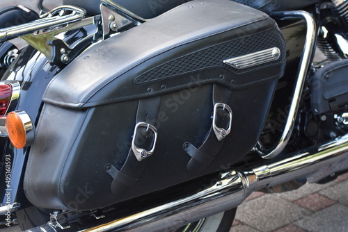 Motorbike, chromed motorcycle part,black leather bag