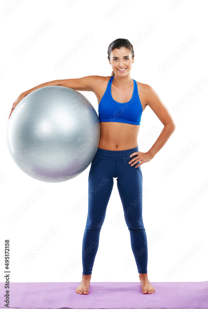 Its the best way to exercise. Portrait of a sporty young woman holding an exercise ball against a white background. Its the best way to exercise. Portrait of a sporty young woman holding an exercise ball against a white background.