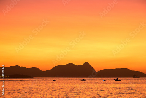 Dawn on the red beach in Urca in Rio de Janeiro.