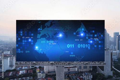 Canvas Print Glowing hologram of Earth planet map on billboard over aerial panoramic cityscape of Kuala Lumpur at sunset, Malaysia, Asia