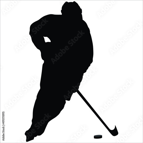 Silhouette of a hockey player with a puck