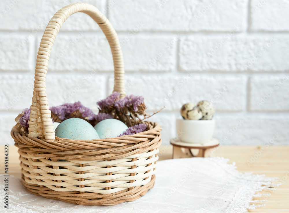 Easter basket with eggs Easter composition. Close-up. Selective focus. Easter basket with eggs Easter composition. Close-up. Selective focus.