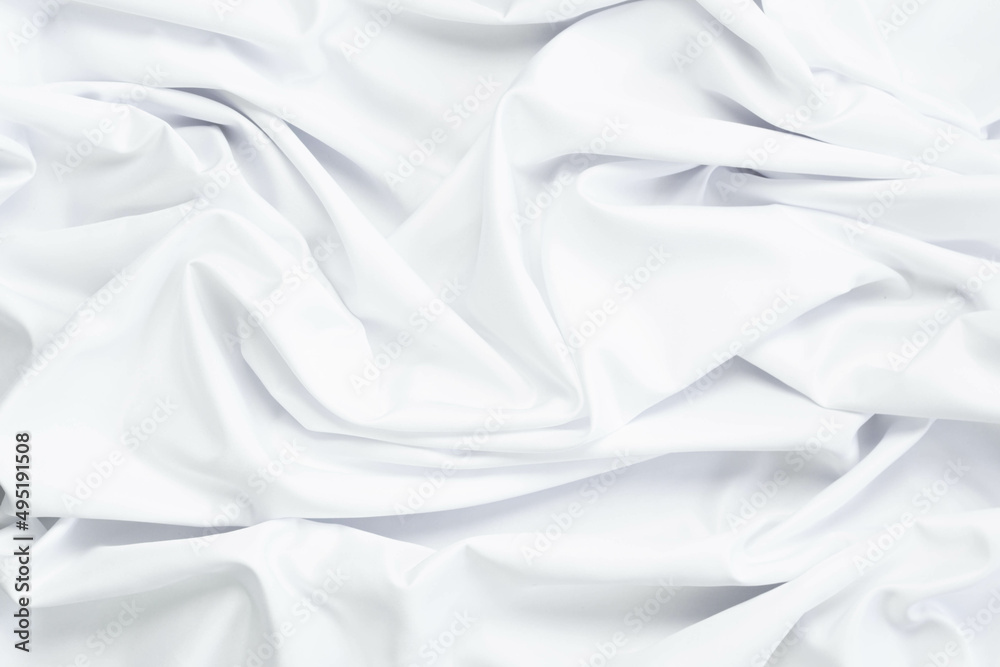 Fototapeta premium White fabric texture that is white cloth surface background with beautiful soft blur pattern.