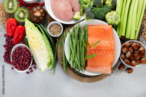 Fotografie Foods with low glycemic index on gray background.