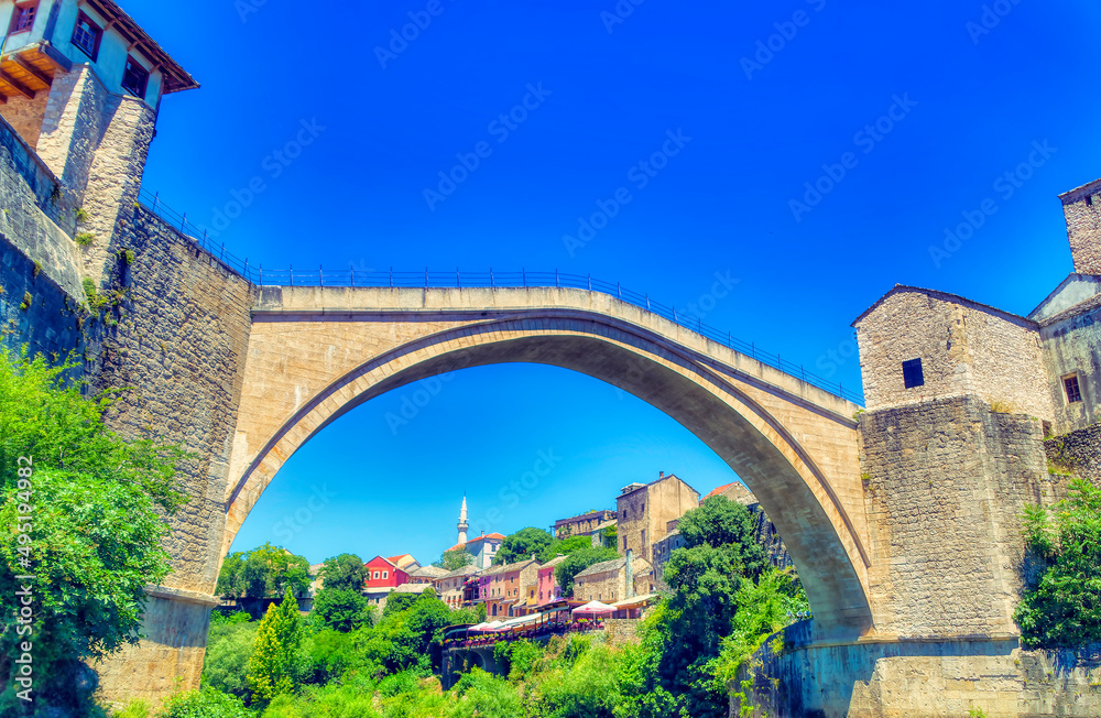 View over famous Old Bridge over river Neretva in Mostar, Bosnia and Herzegovina.