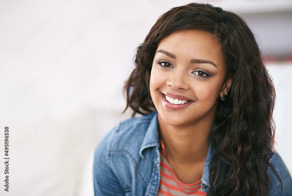 Taking things easy today. Portrait of a young woman relaxing at home. Taking things easy today. Portrait of a young woman relaxing at home.