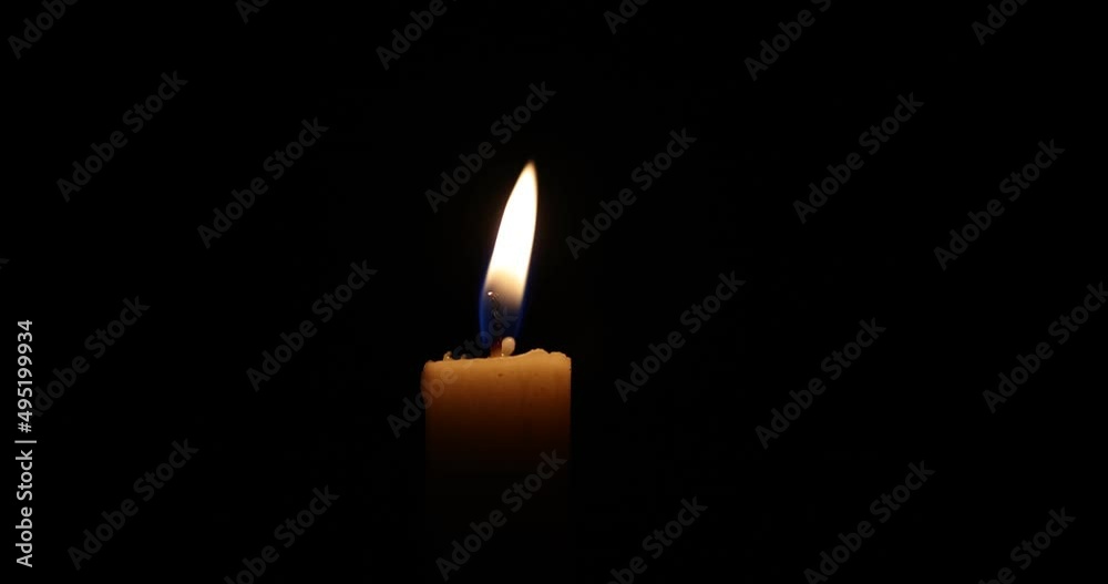 wind blows out a wax candle flame light glowing jumping throbbing dancing flickering in the dark wind blows out a wax candle flame light glowing jumping throbbing dancing flickering in the dark