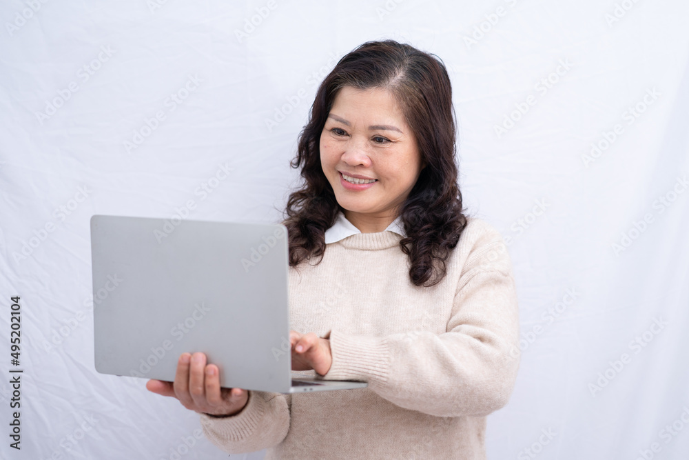 Portrait of senior Asian woman on white background Portrait of senior Asian woman on white background