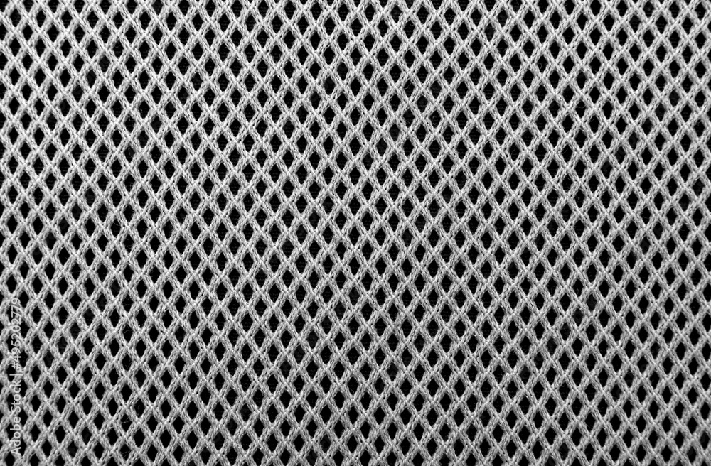 White mesh fabric. Small black check material. pattern White mesh fabric. Small black check material. pattern