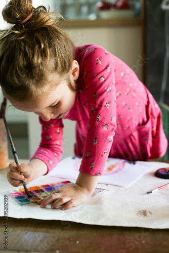 Girl doing painting photo