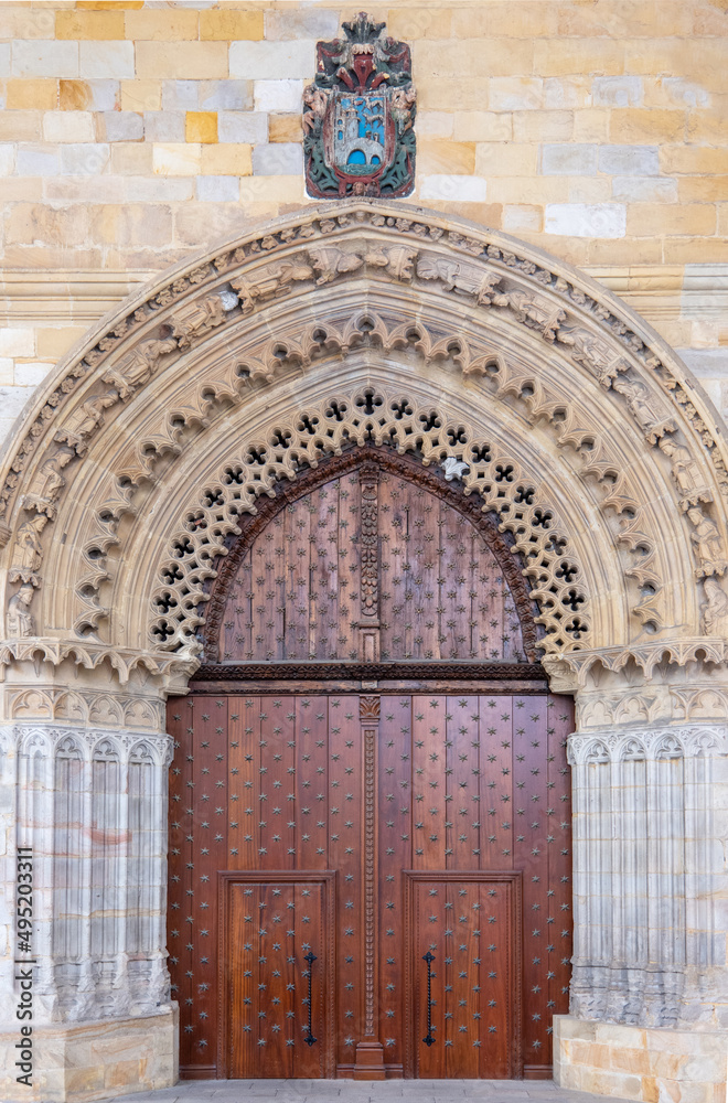Spain, Bilbao, the wooden door in the portico  of the Santiago Cathedral