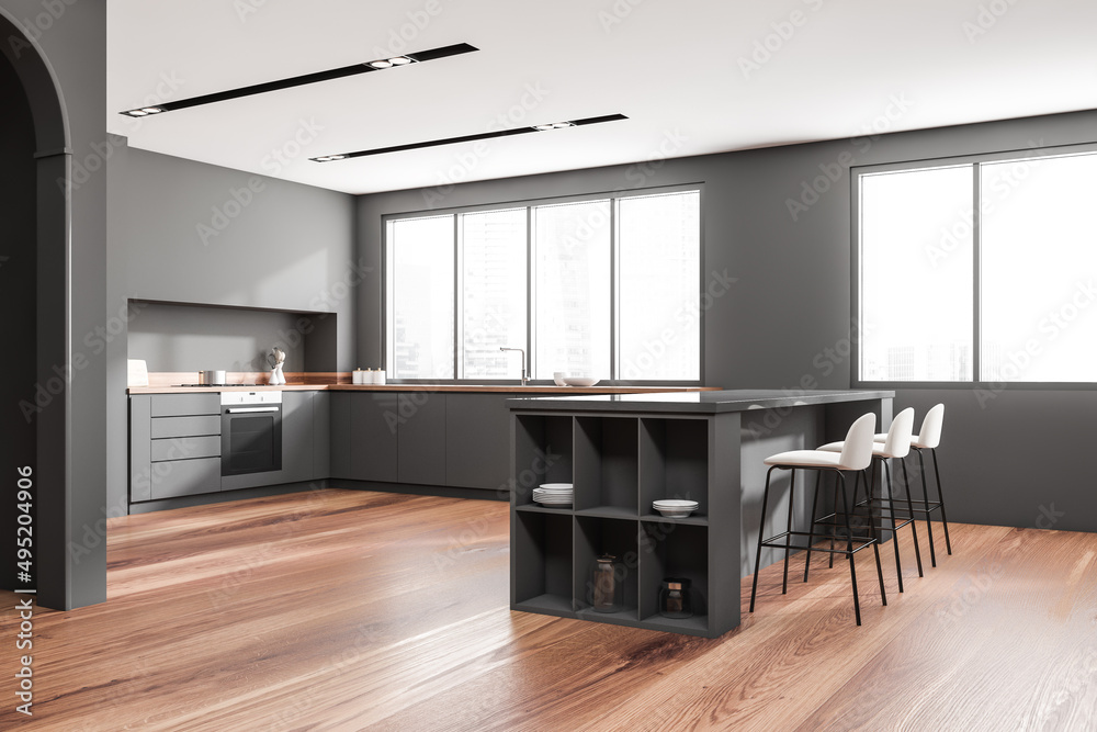 Fototapeta premium Corner view on dark kitchen interior with island with barstools