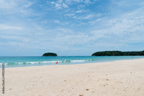 Tourist are carrying body board at Kata beach  Phuket  Thailand   The famous beach in Phuket  Thailand