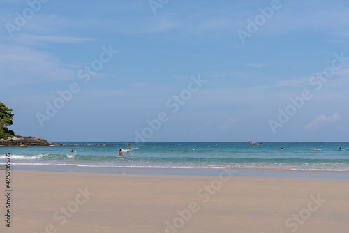 Identified surfer are surfing at Kata Beach © Kanphop