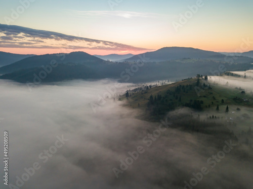 Morning fog in the Ukrainian Carpathians. Aerial drone view.