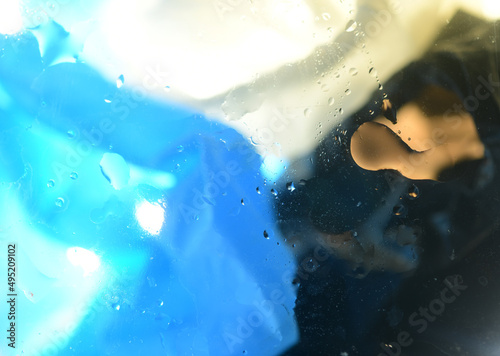 colored background and wet glass