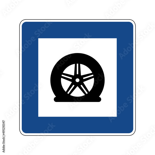 Tire service road sign. Vector illustration of blue traffic sign with flat tyre icon inside. Tires shop, garage symbol isolated on white background. Car wheel, rim and rubber repair.