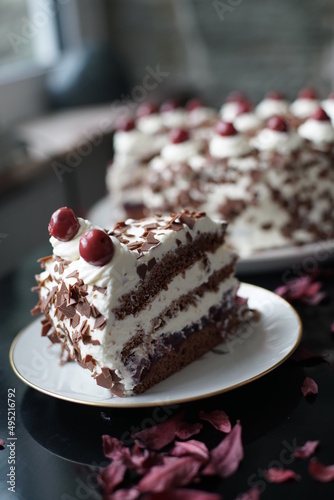 Cake with Cherry on top and cream