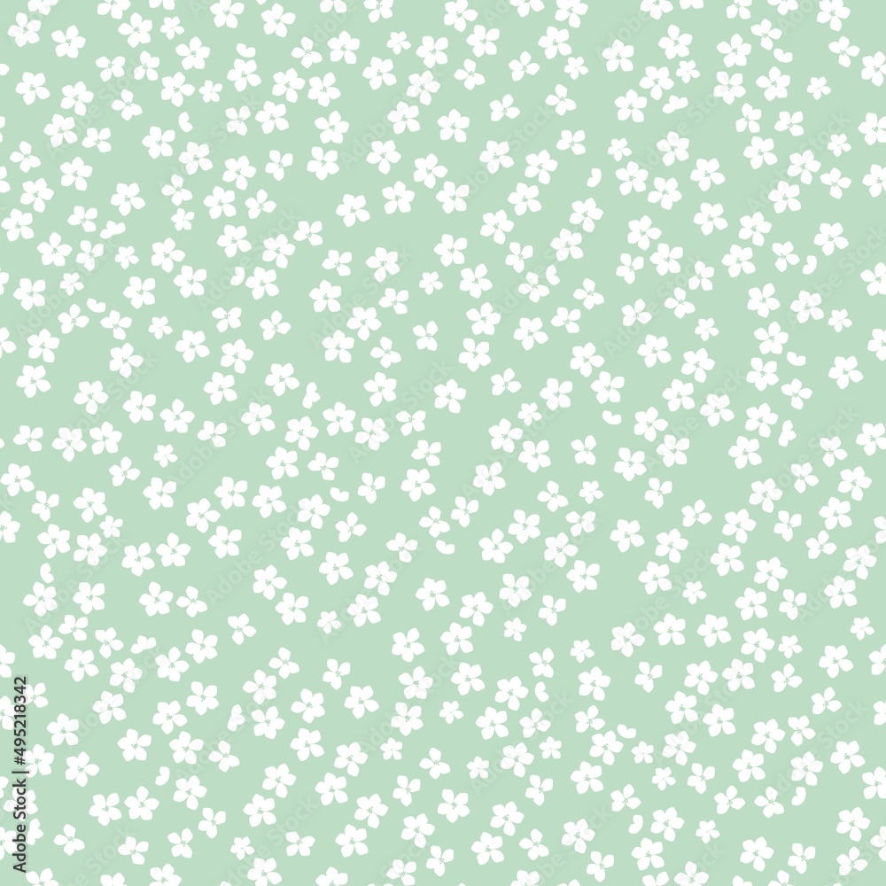 Seamless vintage pattern. small white flowers. light green background. vector texture. fashionable print for textiles, wallpaper and packaging.