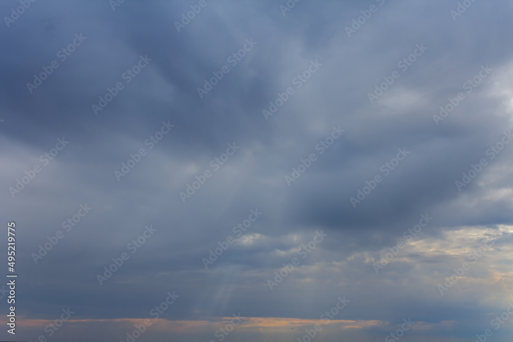 sunset over dramatic cloudy sky natural background