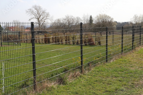 a garden fence made of metal