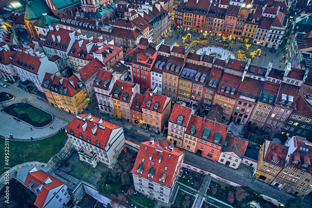 Beautiful panoramic aerial drone skyline sunset view of the Warsaw City Centre with skyscrapers of the Warsaw City and Warsaw's old town with a market square and a mermaid statue, Poland, EU