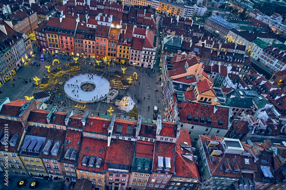 Beautiful panoramic aerial drone skyline sunset view of the Warsaw City Centre with skyscrapers of the Warsaw City and Warsaw's old town with a market square and a mermaid statue, Poland, EU