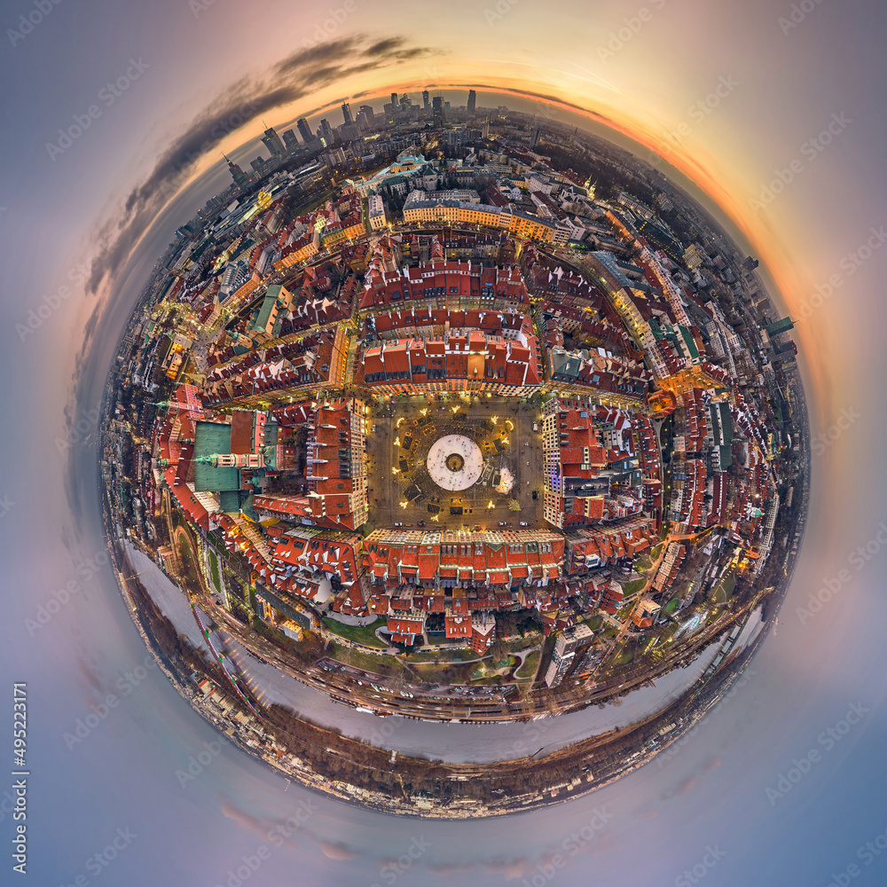 Great 360 degree panorama little planet topdown (top down) view on the Old Town Market Square in Warsaw with a recreational skating rink and a mermaid statue during the Christmas holidays, Poland, EU