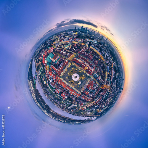 Great 360 degree panorama little planet topdown  top down  view on the Old Town Market Square in Warsaw with a recreational skating rink and a mermaid statue during the Christmas holidays  Poland  EU