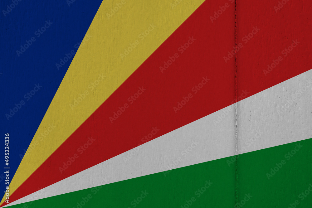 Patriotic wooden background in colors of national flag. Seychelles
