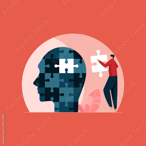 Person Connecting Jigsaw Pieces of Head together, Mental and Psychological Help Concept