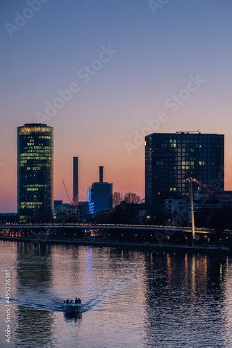 Frankfurt am Main , Architecture - People are seeting near Water. 25/03/2022 Frankfurt city - Germany photo