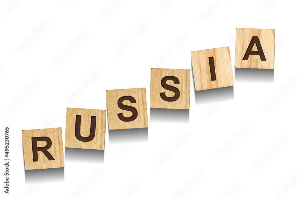 Russia, word on wooden blocks. Isolated on a white background. Russia, word on wooden blocks. Isolated on a white background.