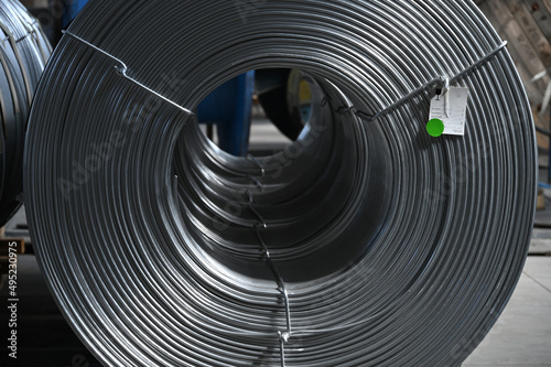 Coils of aluminum wire in production