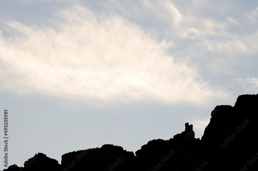 Fototapeta premium Rocky profile and clouds. Teide National Park. Tenerife. Canary Islands. Spain.