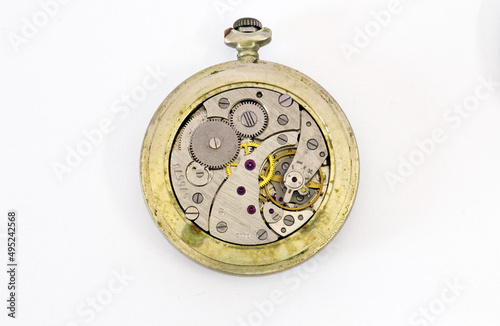 Pocket watch mechanism isolated on white background