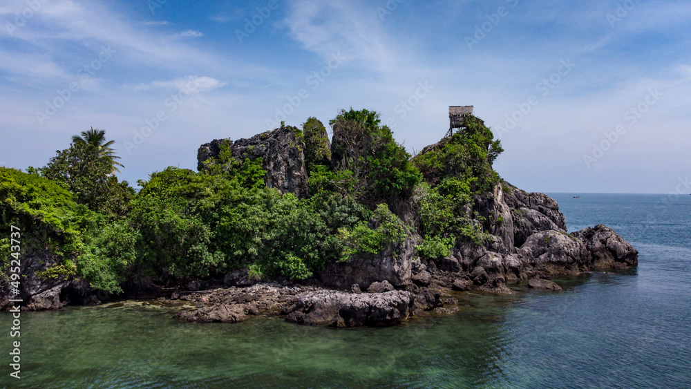 Fisherman wooden house build on the rock at Koh Maphrao Island in Chumphon