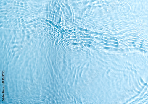 lurred transparent blue colored water surface