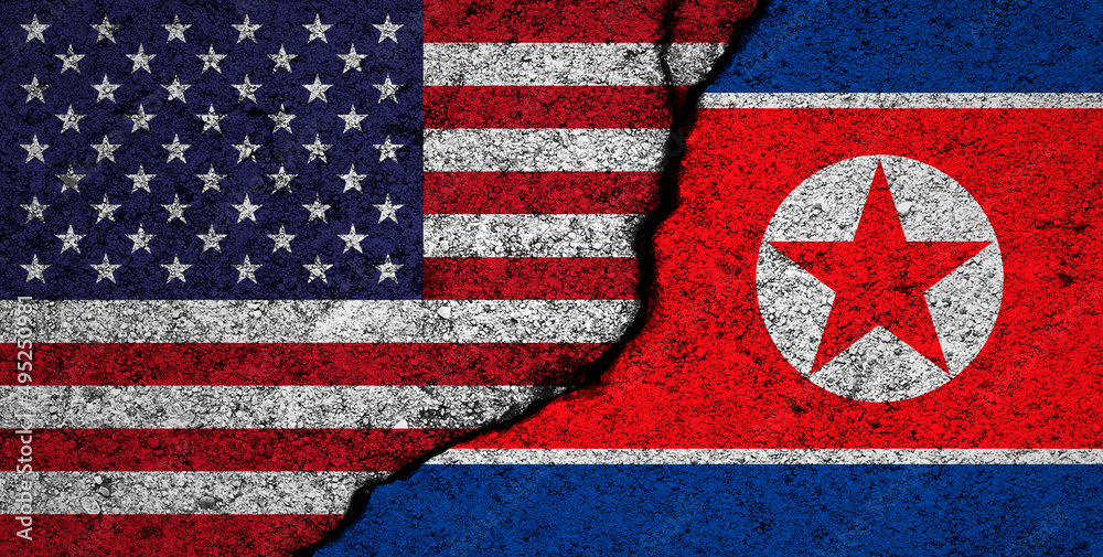 Obraz premium North Korea and USA, America flags background. Cracked wall. Military conflict and war concept photo