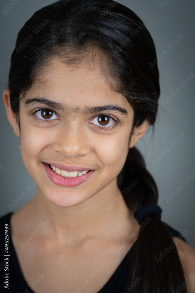 A school age Indian ethnicity girl - portrait shots with different facial expressions. A school age Indian ethnicity girl - portrait shots with different facial expressions.