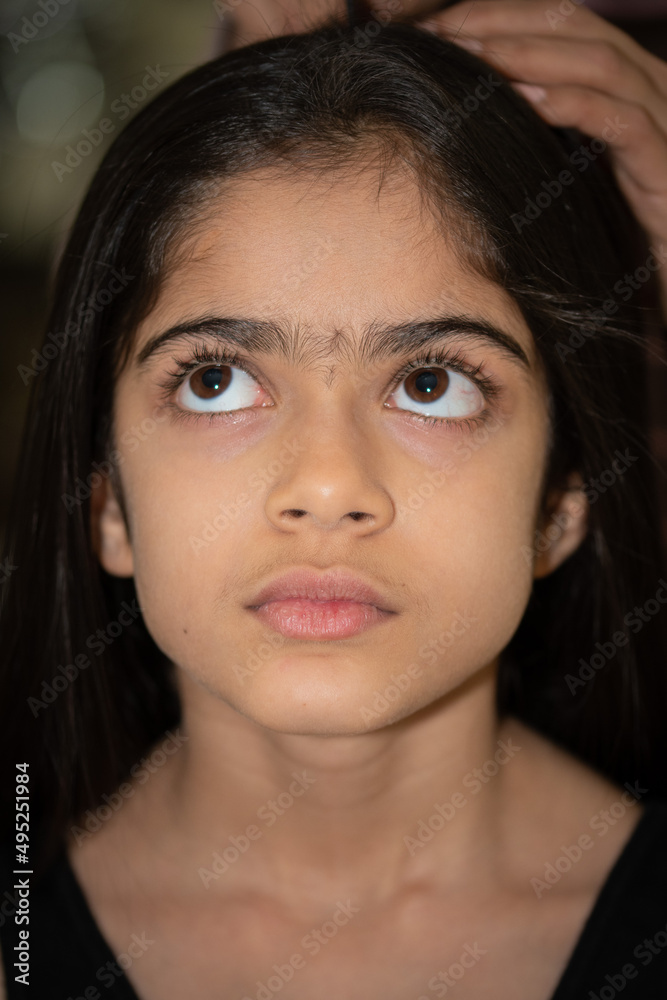 A school age Indian ethnicity girl - portrait shots with different facial expressions. A school age Indian ethnicity girl - portrait shots with different facial expressions.
