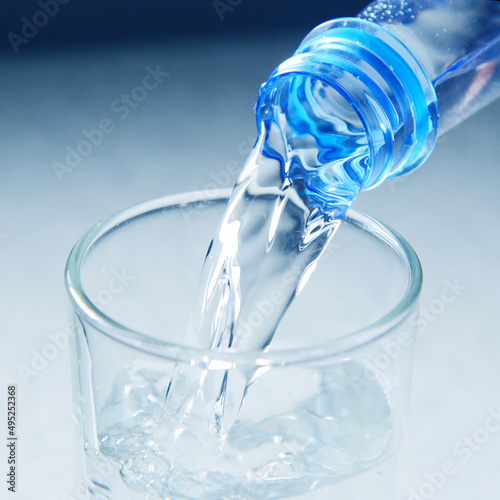 glass is filling splashing water collection on white background