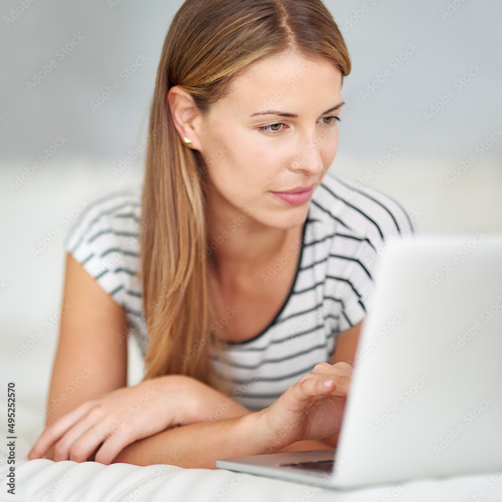 Now this is interesting.... Shot of a young woman browsing the internet at home.