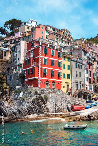 Obraz na płótnie Amazing cityscape with colored houses in Riomaggiore, Cinque Terre, Italy. Amazing places. A popular vacation spot. w salonie
