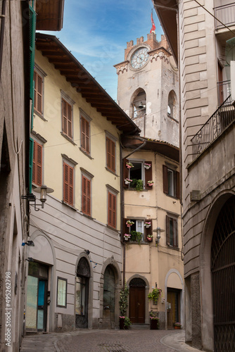 Fototapeta Naklejka Na Ścianę i Meble -  The medieval Italian church is visible in a narrow street, Lovere, Italy