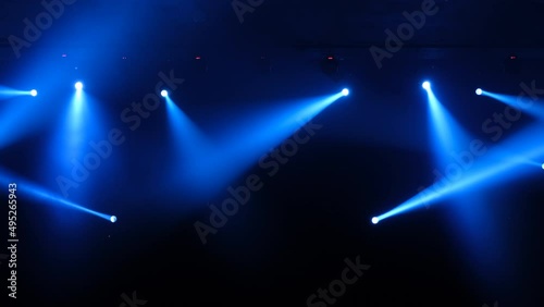 Stage  lighting beams spotlight and smoke of events show or concerts
