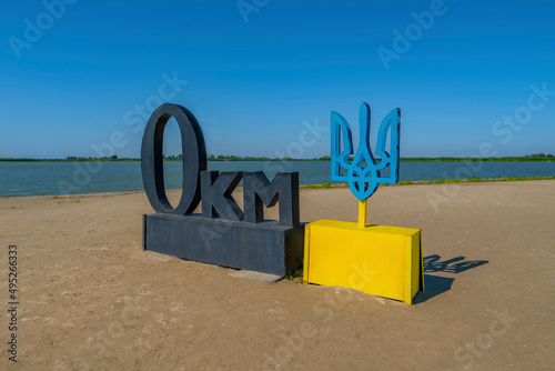 Monument of Zero 0 kilometer of Danube river and Trident emblem of Ukraine at sea coast. Beginning from Black Sea, Vilkovo, Ukraine